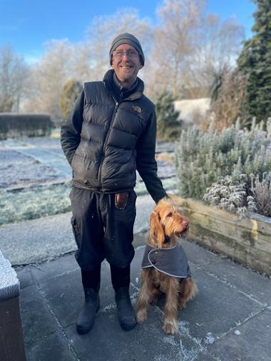 A man with his dog rusty.