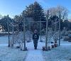 Annie Wynn BEM stood in a very cold Walled Garden from Lets Grow Preston