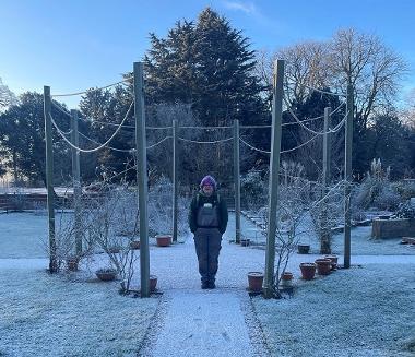 Annie Wynn BEM stood in a very cold Walled Garden  from Lets Grow Preston