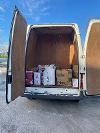 Let's Grow van gets filled with food for delivery