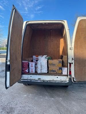 Let's Grow van gets filled with food for delivery
