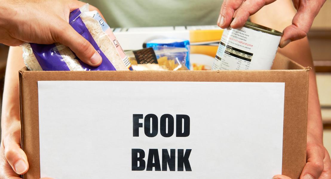 Food bank box A box of food with the words Food Bank on it.